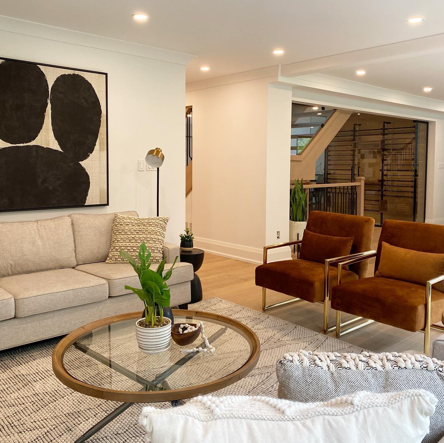 Open-plan living room renovation with mid-century furnishings, Hamilton Ontario